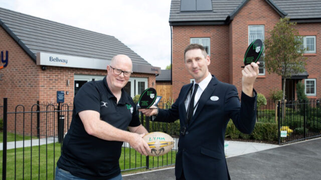 Adam-Breeze-Mini-Junior-Coaching-Coordinator-at-Lymm-RFC-left-with-Bellways-sales-advisor-Neil