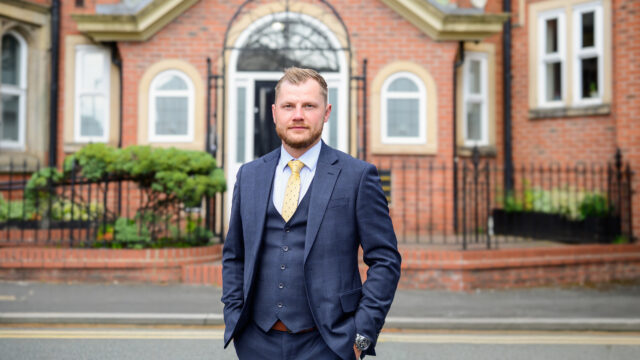 Kamil-Tomaszewski-outside-Warrant-House-in-Altrincham