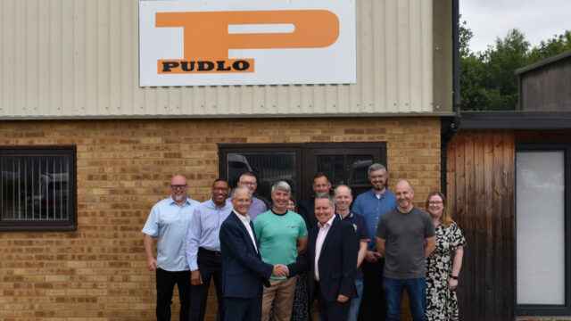Business-Up-North_Malcolm-Thornton-and-Scott-Wilson-shaking-hands-with-the-Pudlo-team-this-week
