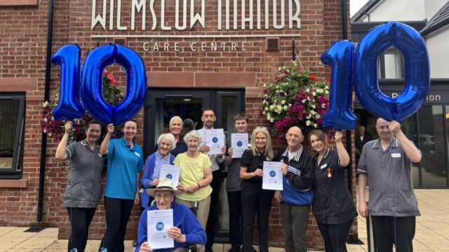 Wilmslow-Manor-staff-and-residents-celebrate-scoring-the-perfect-10