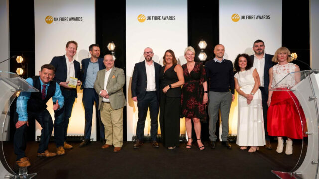 Quickline-team-members-celebrating-the-companys-double-win-at-the-UK-Fibre-Awards-2026