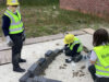 School children learn to lay bricks with Bellway