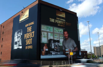 Manchester landmark expands as outdoor advertising enters a new era