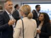 generic conference, blurred out people, slightly abstract, candid,
