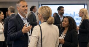 generic conference, blurred out people, slightly abstract, candid,